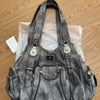 A dark gray vintage PU leather hobo shoulder bag with a drawstring closure and silver hardware, packaged in clear plastic.