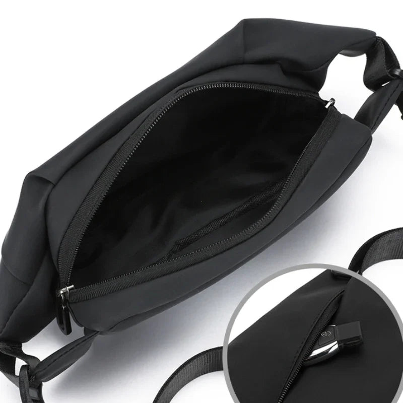Schwarze minimalistische Lauf-Bauchtasche von oben mit Reißverschlussdetails