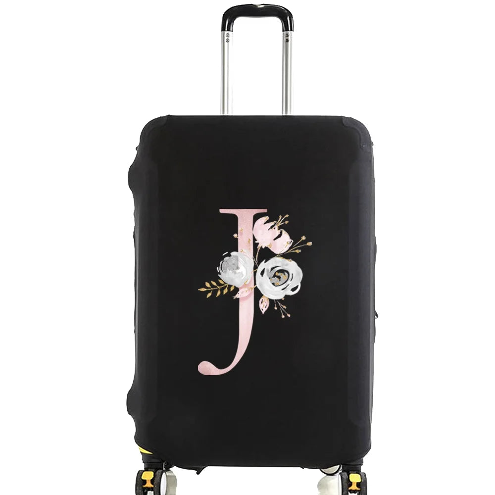 Black luggage with a pink floral letter J design and silver handle.