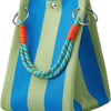 A striped knit bucket tote bag in blue and olive green with orange cord handles.