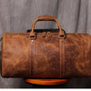 Braune Vintage-Leder-Totebag mit Ledergriffen und Messing-Hardware.