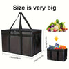 A large black reusable insulated food delivery bag with handles, shown next to various fresh produce.