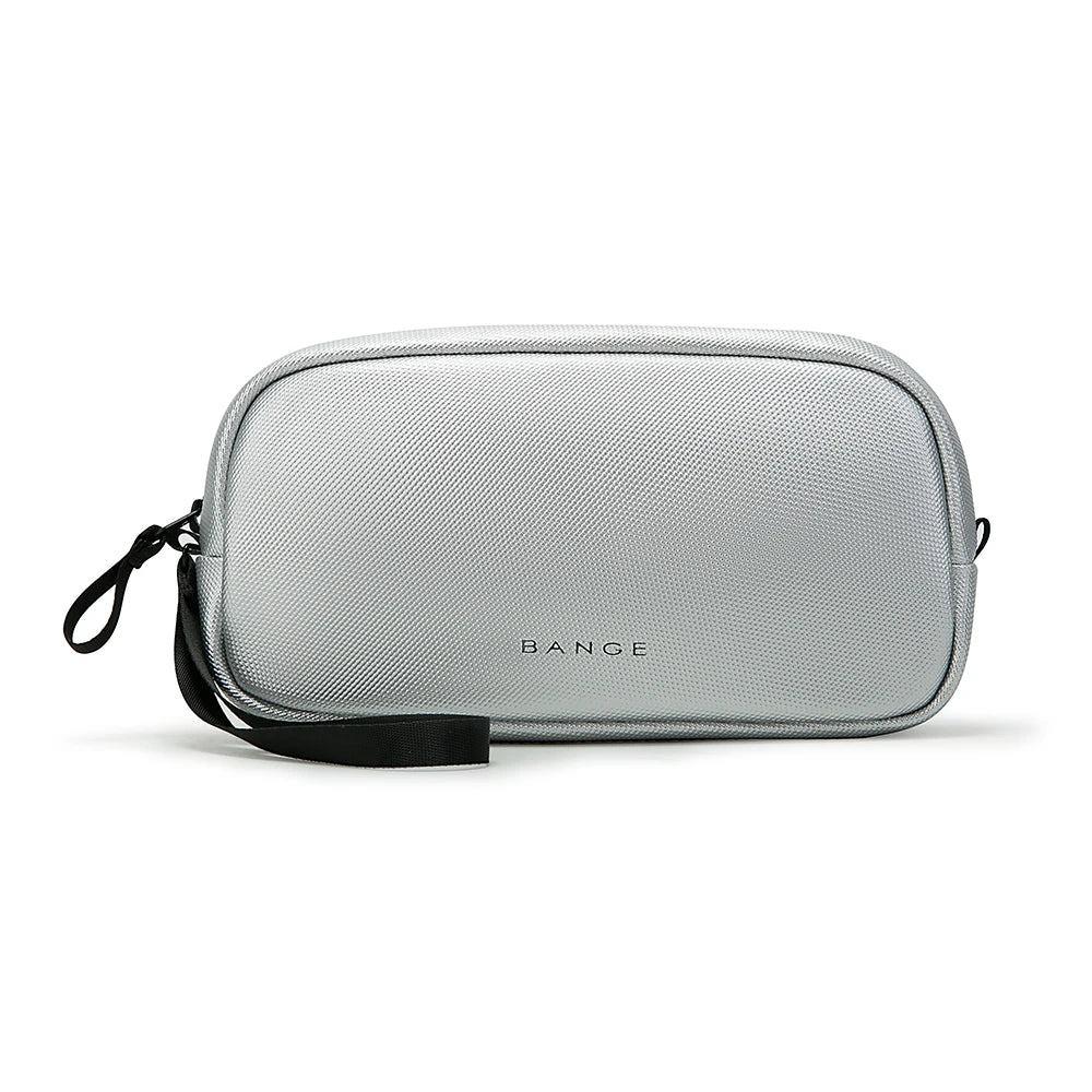 A silver travel electronics organizer pouch with a black strap, shown flat.