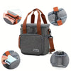 A set of insulated double-layer lunch bags in gray and pink, including a small pouch and a larger bag.