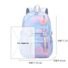 A light blue and pink patterned jacquard laptop backpack for students with a fluffy pink charm