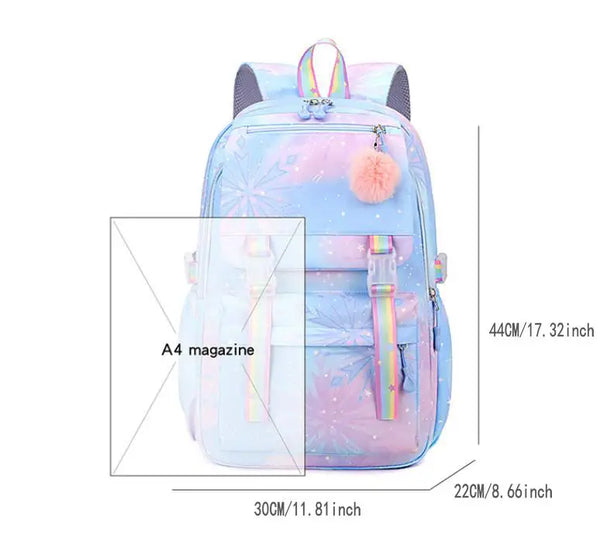 A light blue and pink patterned jacquard laptop backpack for students with a fluffy pink charm