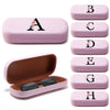 A set of personalized pink PU leather hard shell eyeglass cases labeled with letters A through H, each featuring a floral cha