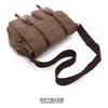 A brown canvas messenger bag for men with dark brown leather straps, shown from above.
