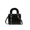 Black diamond grid textured crossbody bag with gold hardware