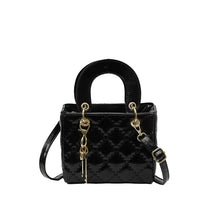 Black diamond grid textured crossbody bag with gold hardware