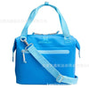 A bright blue insulated cooler lunch bag with a light blue detachable crossbody strap.