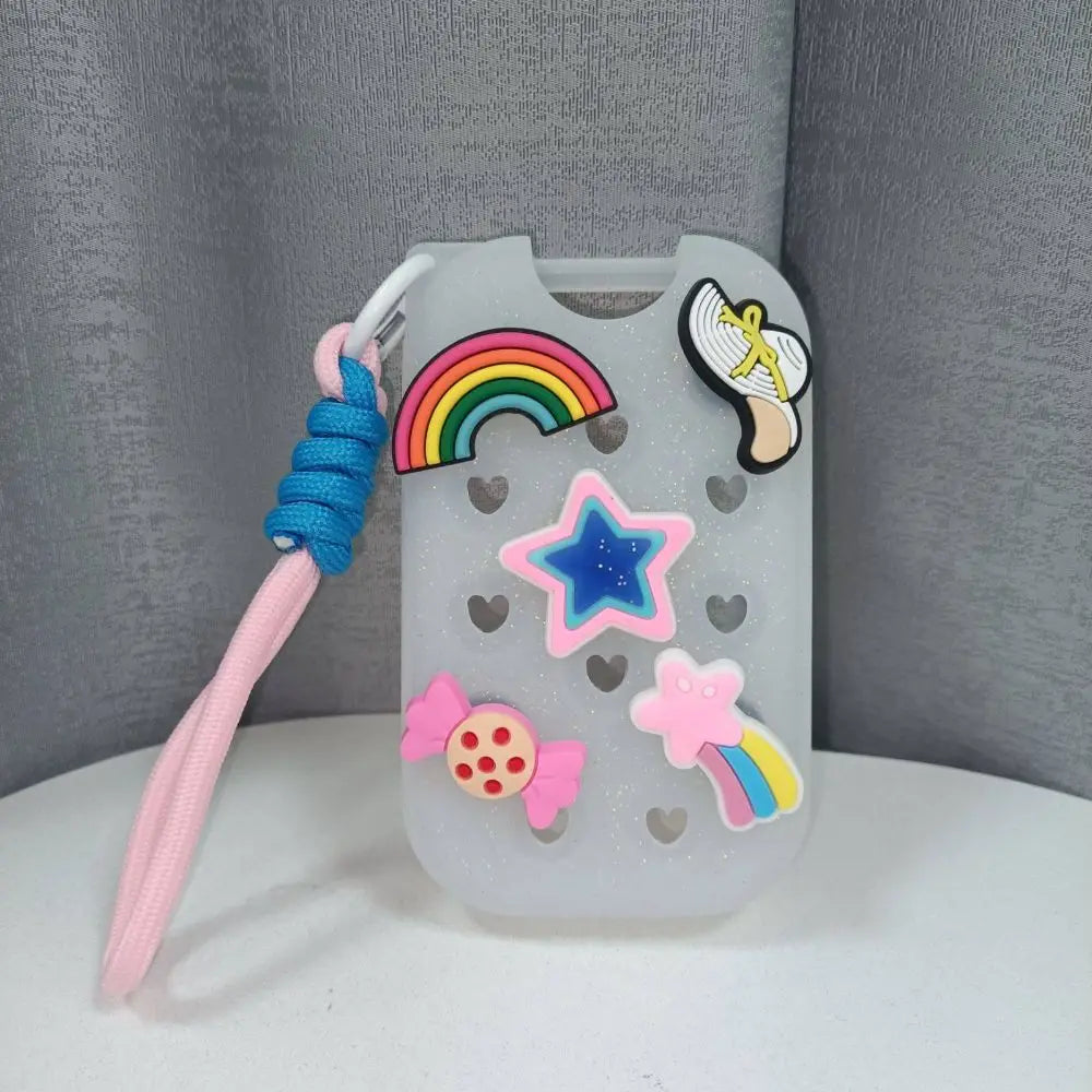 Clear EVA protective case for hand sanitizer spray with a rainbow charm keyring