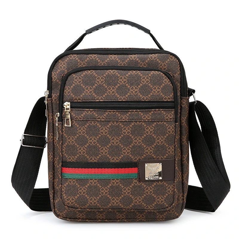 Brown patterned sling bag with black strap and leather accents