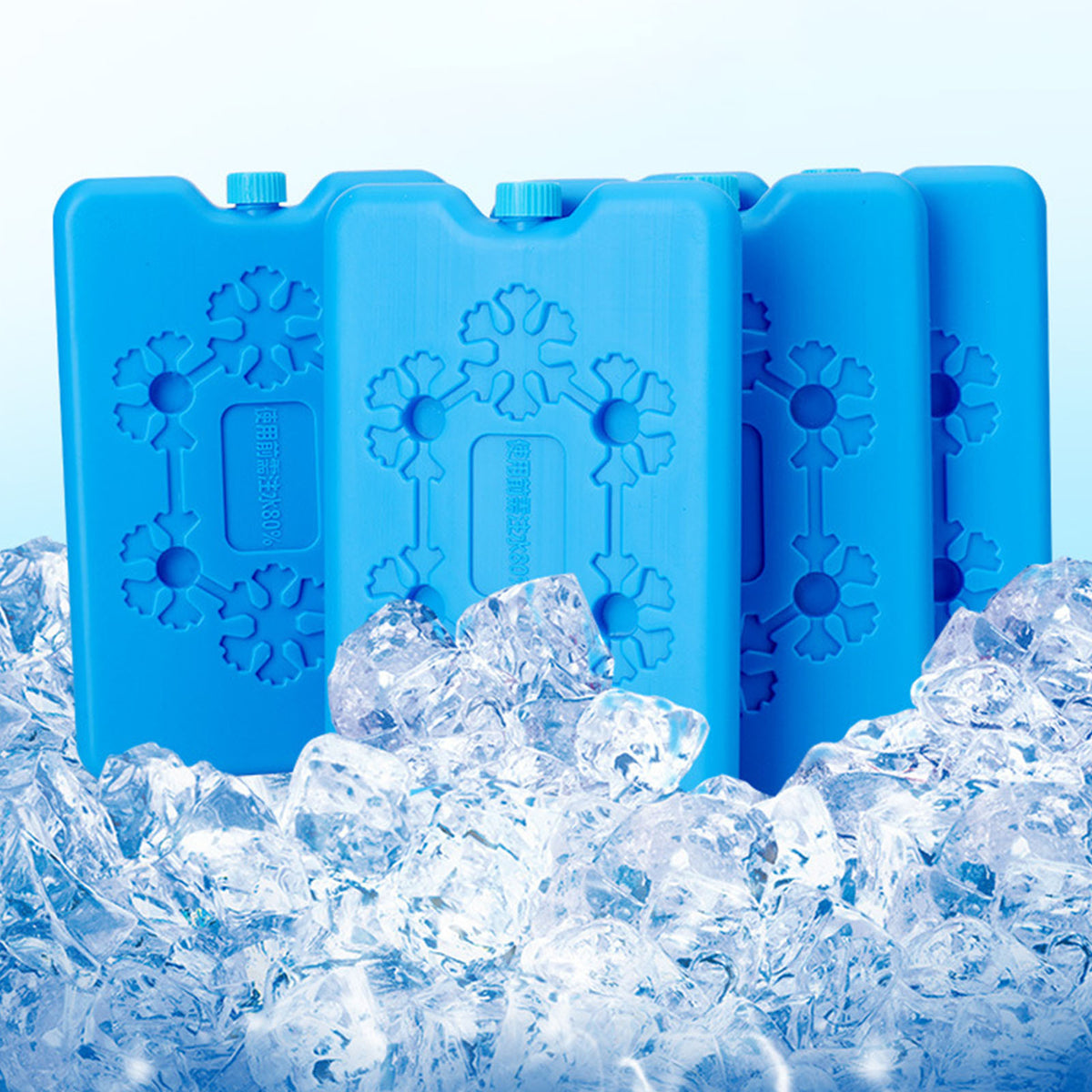 Blue reusable ice packs are shown submerged in crushed ice.