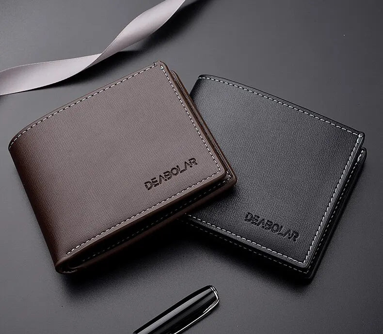 A brown and black PU leather folding wallet is shown on a dark surface with a ribbon in the background.