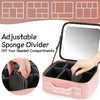 Pink sponge divider makeup case with adjustable compartments shown next to a mirror.