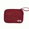A maroon travel cable organizer pouch with multiple compartments for electronics accessories.