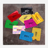 A collection of colorful anti-scan card sleeves for RFID protection, including red, yellow, green, purple, and blue.