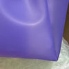 Sac en gelée transparent violet montré de profil sur fond blanc.