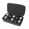 A black multi-slot travel watch organizer case with a soft lining and open lid displaying several watches.