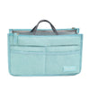 Light blue fabric handbag organizer insert with a gray lining and a dark strap.