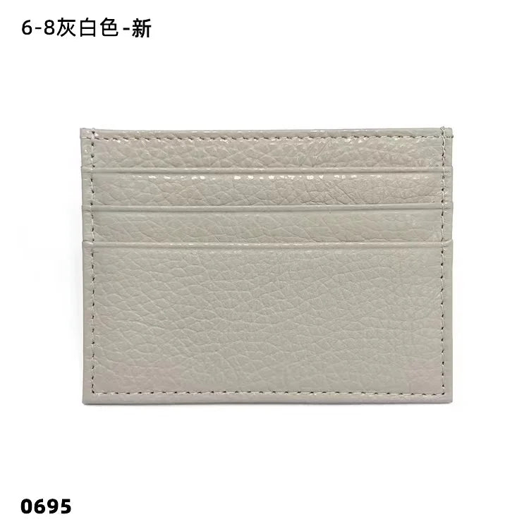 Helles beige echtes Kuhleder-ID-Kartenträger-Wallet mit gestickter Textur.