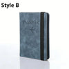 A dark blue passport holder with a black trim and an airplane icon embossed on the cover.
