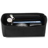 Black felt organizer insert for handbags with a zippered compartment and a small metal accessory.