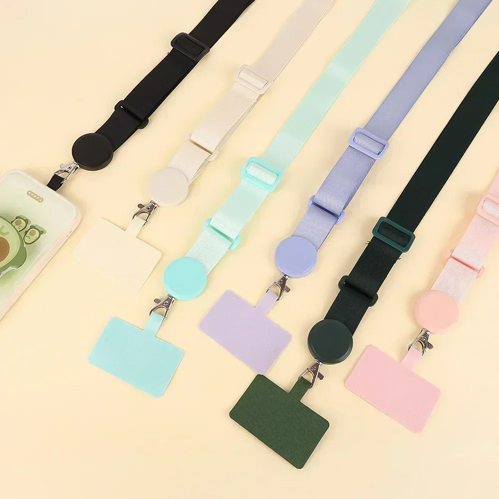 A collection of colorful adjustable phone lanyards with neck straps shown against a light background.