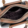A brown leather shoulder crossbody bag with a zippered compartment shown from the top view.