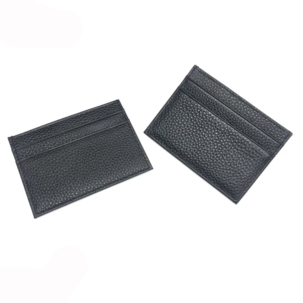 Schwarzes echtes Kuhleder-Ausweis-Wallet von oben.