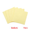 A set of ten yellow polishing cloths for silver and gold jewelry, stacked and displayed.