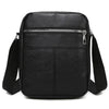 Black waterproof PU leather sling bag with a zippered front pocket and adjustable strap.
