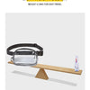 A clear PVC waist bag with an adjustable strap resting on a wooden surface.
