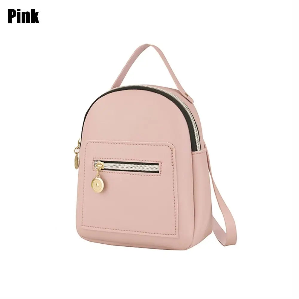 A pink waterproof PU mini backpack with a zippered front pocket and shoulder straps.