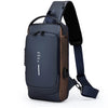 Navy blue anti-theft crossbody chest bag with brown accents shown from the side.