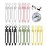A collection of silicone cable ties and cord organizers in various colors including pink, white, black, and olive green.