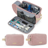 A pink toiletry bag with an open lid showing various grooming tools and cosmetics inside.