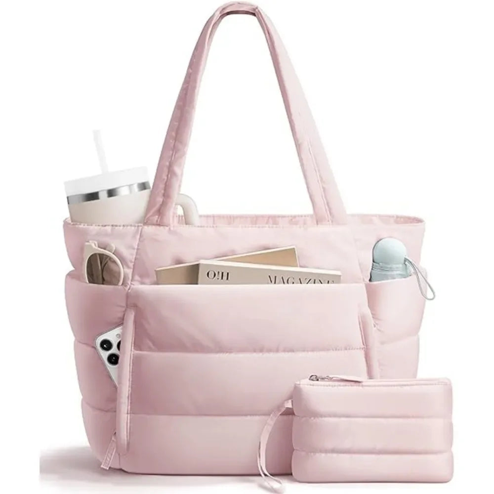 A pink quilted puffer tote bag with pockets and a matching pouch shown against a white background.