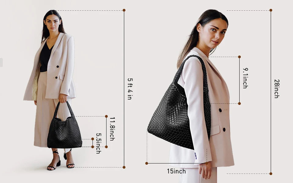 A woman models a beige blazer and white pants while holding a black handwoven faux leather tote bag.