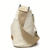 A beige nylon crossbody shoulder bag with a tan strap and multiple zippered compartments.