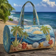 A quilted blue travel duffel bag featuring tropical leaf and seashell patterns resting on a wooden surface.