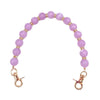Handcrafted resin stone bead necklace with purple beads and gold-toned chain.