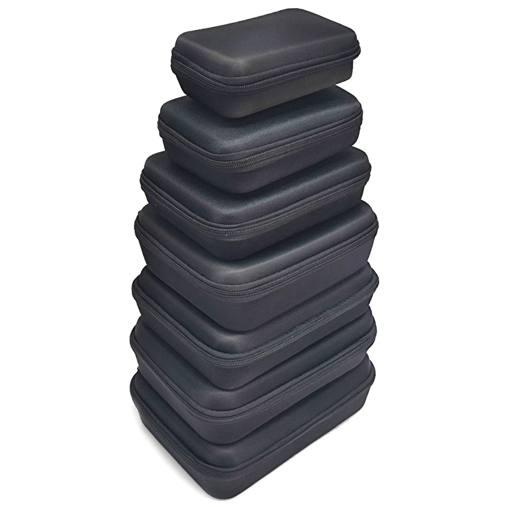 A stack of black portable EVA storage and travel organizer bags.