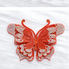 Orange rhinestone butterfly applique sticker with detailed wing patterns