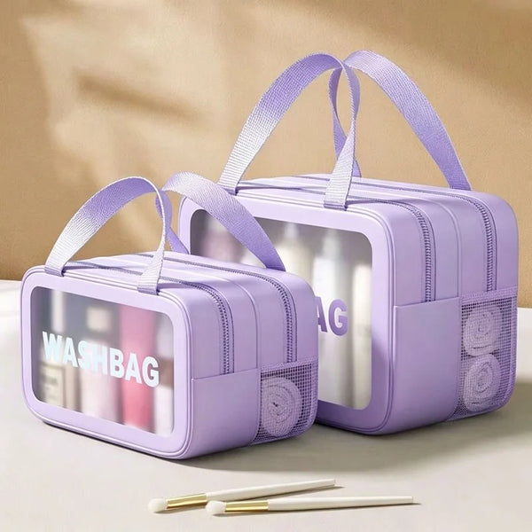 A purple travel toiletry bag with a clear window showing toiletries and a mesh pocket for separation.