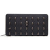 Black leather wallet with skull embellishments on the surface