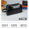Black PU leather clutch bag with a strap shown in a studio setting.