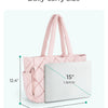Pink quilted puffy tote bag with a laptop compartment shown in daily-carry size.