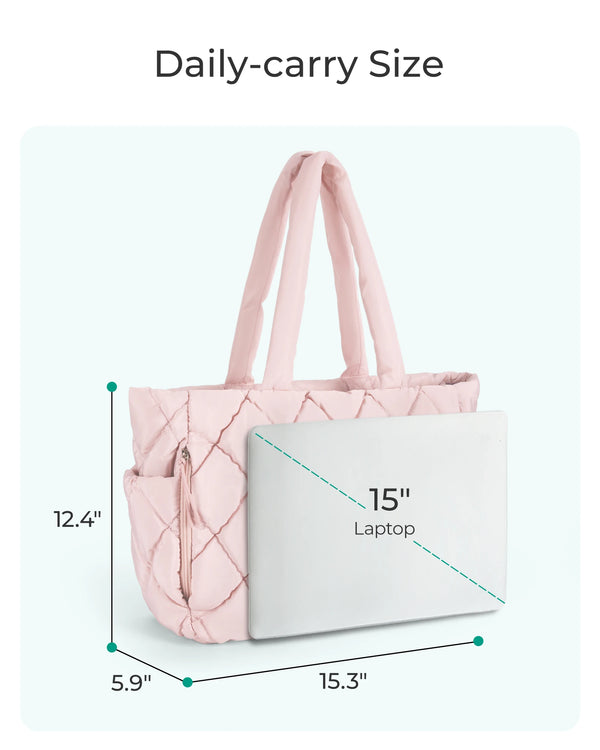 Pink quilted puffy tote bag with a laptop compartment shown in daily-carry size.